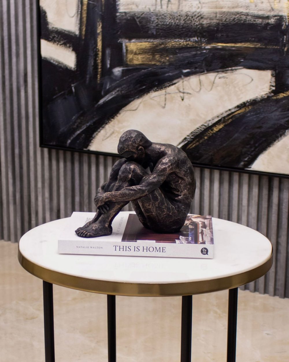 Escultura de Hombre Sentado Pequeño